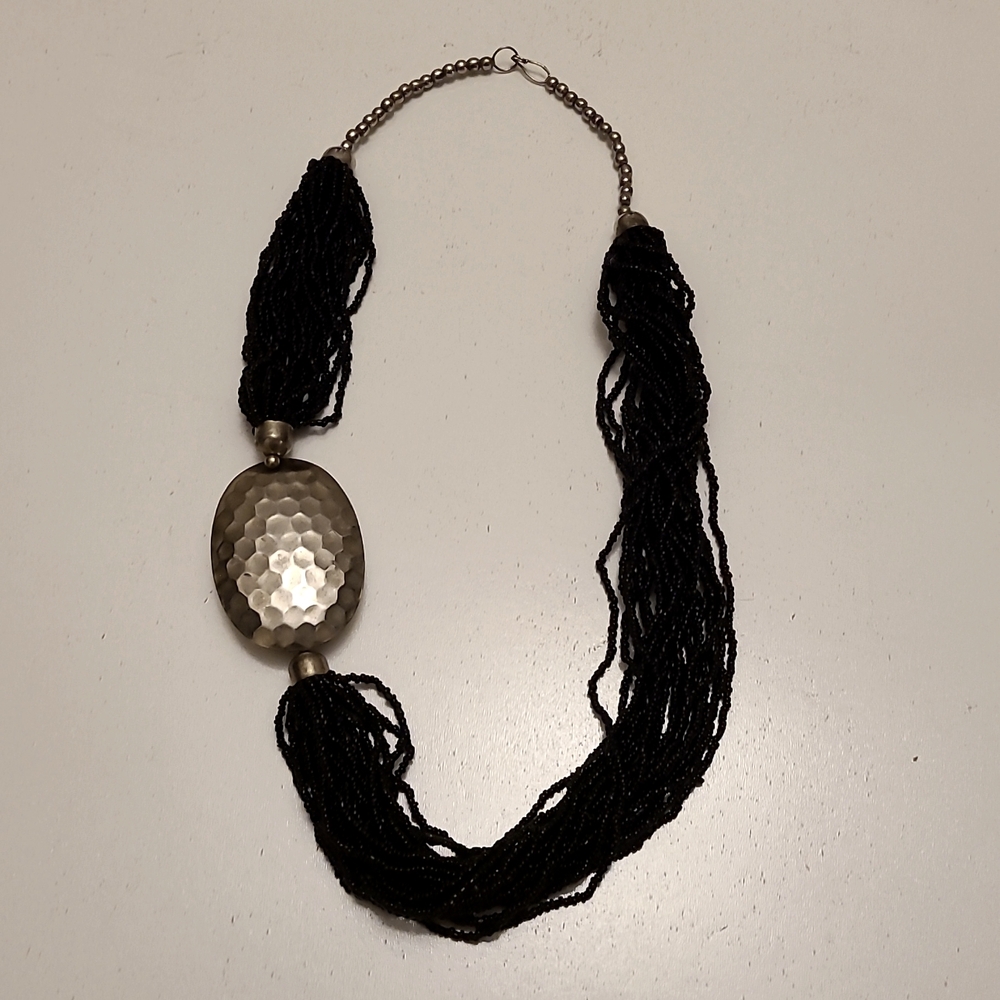 Black Beaded Necklace with Silver Pendant